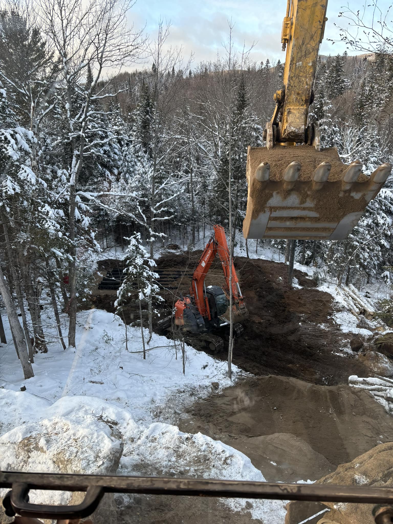 pelle mécanique excavation construction projet clé en main